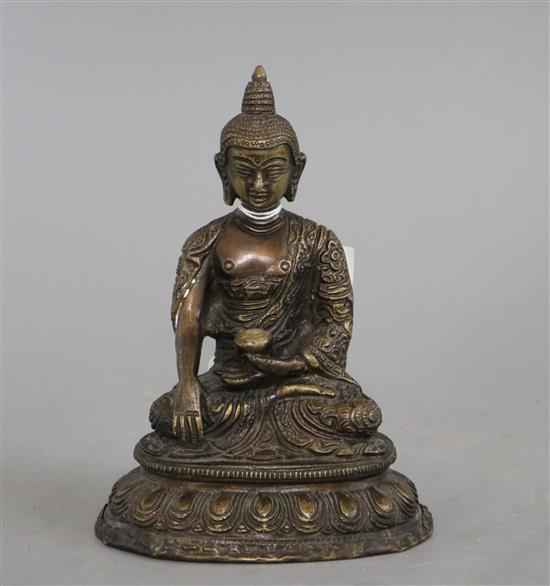 A bronze figure of Buddha height 16cm
